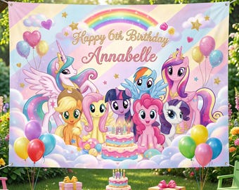 May include: A colorful birthday banner featuring cartoon ponies, a rainbow, and balloons. The banner reads "Happy 6th Birthday Annabelle" in gold script. A birthday cake and wrapped gifts are in the foreground.