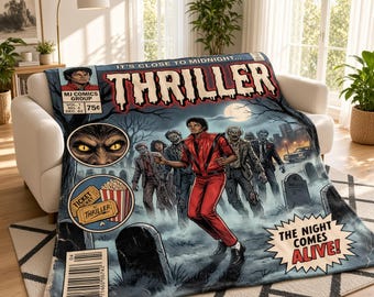 May include: A rectangular throw blanket featuring a comic book cover graphic titled Thriller. The design shows a person in a red jacket surrounded by zombies in a graveyard at night, with text reading It's Close To Midnight and The Night Comes Alive.