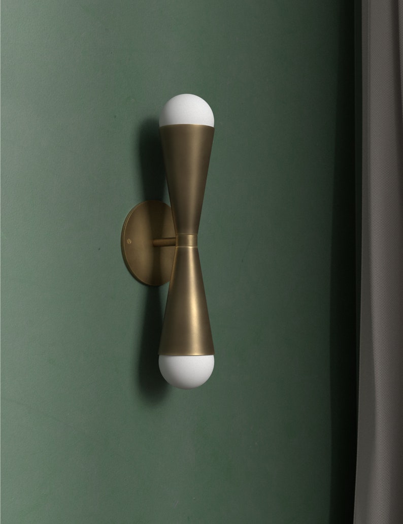 Bowtie wall sconce Mid Century inspired Aged Brass