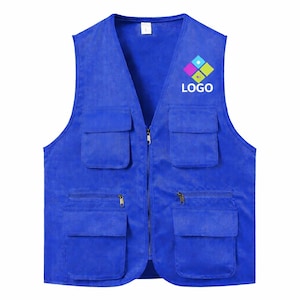 May include: A blue utility vest with multiple pockets and a zipper closure. The vest has a logo on the upper right chest area. The vest is made of a durable material and is designed for functionality and storage.