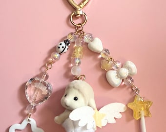 Ręcznie robiony brelok z kalikońskim zwierzątkiem – Baby Cherub Lamb