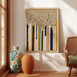 Tall poster of colorful book spines rising into a daisy field, hanging near a bright window above floor vases and a cane chair in golden afternoon light.