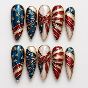 May include: A white ceramic mug with a black handle and the text "But First, Coffee" in a handwritten style. The mug is on a white surface. The mug is approximately 4 inches tall.