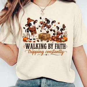 Walking by Faith Tripping Constantly Fall Cow Shirt, Funny Christian Comfort Colors® Tee, Autumn Faith Humor Gift, Christian Shirt for Women