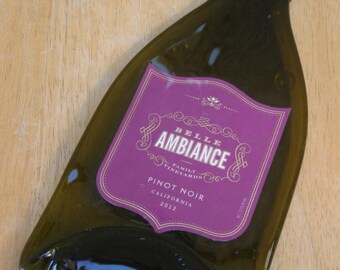 Belle Ambiance wine bottle This flattened (slumped) bottle makes a great cheese board, spoon rest, candle holder, wall hanger "ETC"