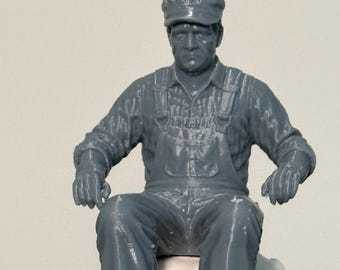 Unpainted G Scale seated train engineer figurine