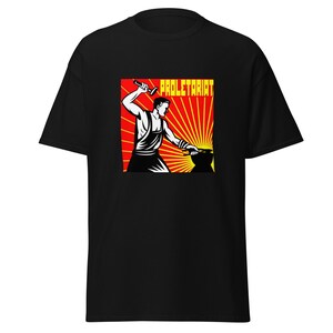 May include: Black t-shirt featuring a graphic of a blacksmith with a hammer and anvil, set against a red and yellow sunburst design. The word "PROLETARIAT" is printed above the figure in yellow block letters.