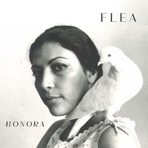 May include: Black and white portrait of a person with dark hair and a white dove perched on their shoulder. The word "FLEA" is printed above the person's head, and the word "HONORA" is printed below.