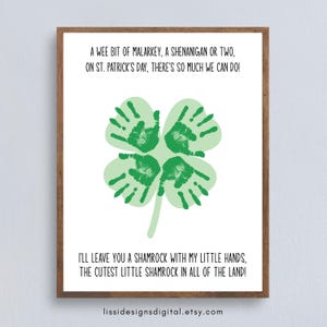 May include: A framed print with a white background features a green shamrock made of handprints. The text reads, "A wee bit of malarkey, a shenanigan or two, on St. Patrick's Day, there's so much we can do!" and "I'll leave you a shamrock with my little hands, the cutest little shamrock in all of the land!"