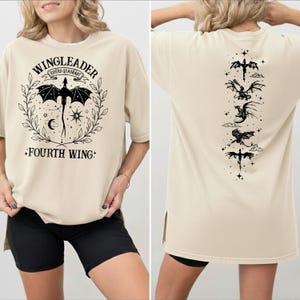 The image is a collage of two photos. In the left photo, a woman is wearing a beige t-shirt with a graphic design featuring a dragon and the text "WINGLEADER RIDERS OF RAINBOW". In the right photo, the back of the same t-shirt is visible, showing the same design and text.