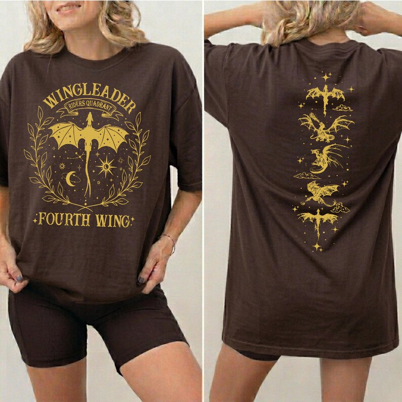 a woman wearing a brown t-shirt with a graphic design on the front and back.