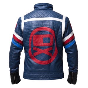 May include: A blue leather jacket featuring a quilted upper back and shoulder panel, a large red circular emblem with a stylized logo on the back, and white, red, and blue stripes on the sleeves. The cuffs are black with silver-toned zippers.