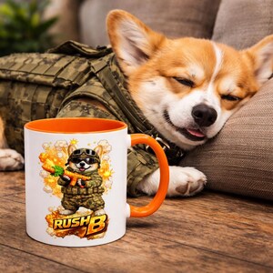May include: A white ceramic mug with an orange interior and handle, featuring a cartoon corgi in military attire holding a carrot gun. The mug has the text "RUSH B" on it. A sleeping corgi in a camouflage jacket rests nearby.