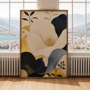 May include: A framed art print featuring an abstract floral design. The artwork showcases a large, off-white flower with speckled details, set against a backdrop of navy, gold, and beige shapes. The print is in a wooden frame, with a city and mountain view in the background.