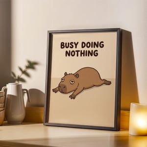 Capybara Busy Doing Nothing Poster - Modern Cartoon Illustration, Beige and Dark Brown