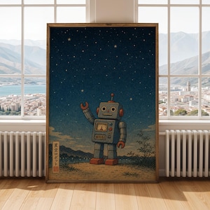 May include: A framed print featuring a vintage-style robot with a raised arm, set against a starry night sky. The robot is gray with red accents, standing on a hill with a mountain backdrop. The print has Japanese text.