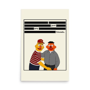 May include: A poster featuring two cartoon characters, one in a red and white striped shirt and a baseball cap, the other in a gray shirt. The text reads "just gay friends."