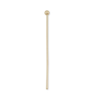 K&ouml;nnte beinhalten: Eine goldfarbene Stecknadel mit rundem Kopf. Die Nadel ist etwa 3,8 cm lang.