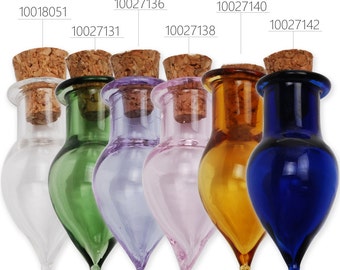 May include: Six small glass bottles with cork stoppers. The bottles are clear, green, purple, pink, amber, and blue. The bottles are all the same shape, with a rounded bottom and a pointed top.