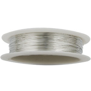 May include: A spool of silver-colored wire on a white plastic bobbin.