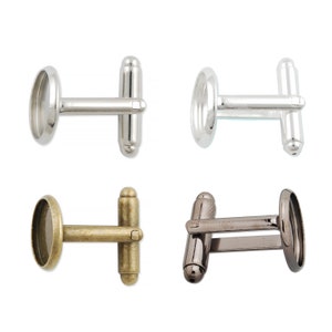 May include: Three pairs of cufflinks with round bezels. The cufflinks are silver, gold, and black.