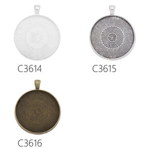 20 st 35 mm runda hängen i zinklegering med cameo-cabochon, passar till 35 mm cabochoner