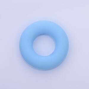 May include: A light blue rubber ring, also known as a stress ball or a finger ring, is a simple and effective tool for relieving stress and improving hand strength.