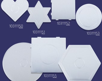 May include: Six white plastic pegboards in different shapes, including a heart, star, circle, square, hexagon, and a larger circle. Each pegboard has a small hole in the center. The pegboards are labeled with numbers: 10311150, 10311151, 10311152, 10311153, 10311154, and 10311156.