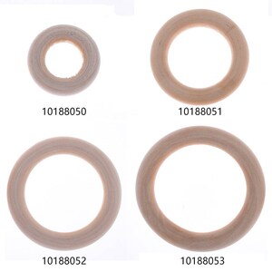May include: Four wooden rings of varying sizes. The rings are all made of natural wood and have a smooth finish. The rings are labeled with the product numbers 10188050, 10188051, 10188052, and 10188053.