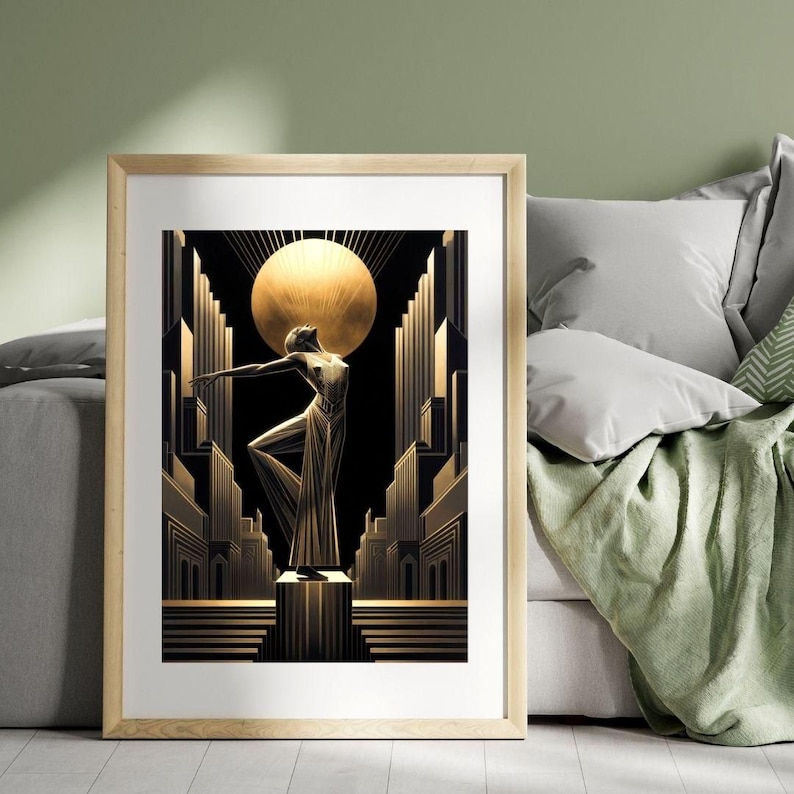 an Art Deco style painting of a woman in a golden dress standing on a pedestal, with a large golden circle above her. The painting is framed and placed on a white wall, with a gray couch and a green blanket visible in the background.
