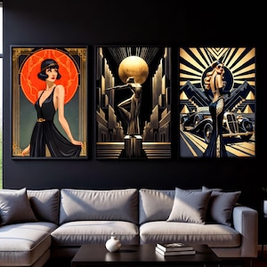 a modern living room with a gray sofa and a black coffee table. Above the sofa, there are three framed artworks displayed on the wall, each depicting a woman in a different style of dress.