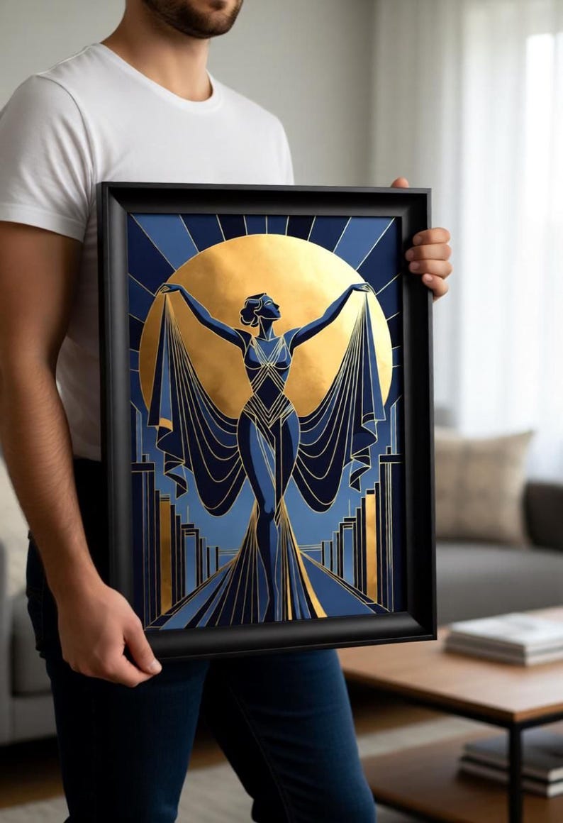 A man is holding a framed artwork featuring an abstract design with a woman and a large sun-like element.