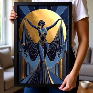 A woman is holding a framed artwork featuring an abstract design with a stylized female figure and a golden sun-like element.