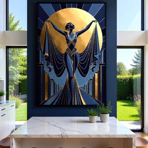 a large, colorful painting of a woman with outstretched arms, set against a blue wall with a large sun-like design. The painting is displayed above a white marble countertop, which has three stools placed around it. The overall scene appears to be a modern, stylish interior with a focus on the artwork as the central element.