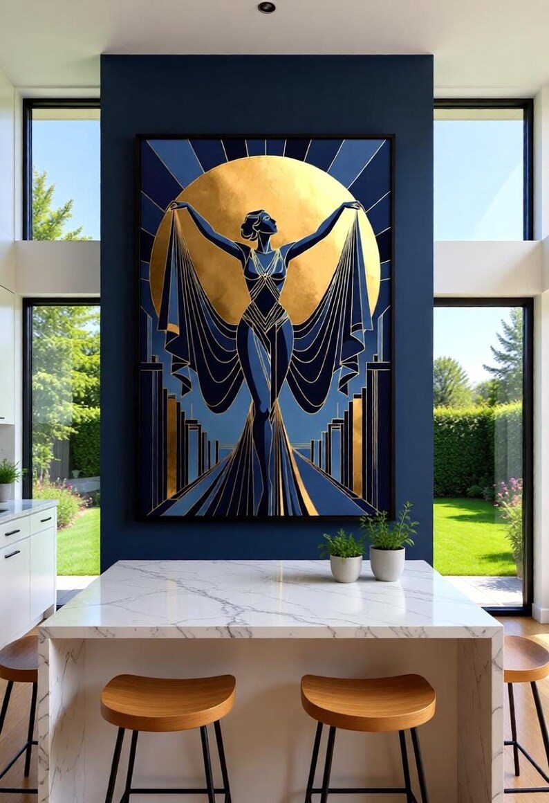 a large, colorful painting of a woman with outstretched arms, set against a blue wall with a large sun-like design. The painting is displayed above a white marble countertop, which has three stools placed around it. The overall scene appears to be a modern, stylish interior with a focus on the artwork as the central element.