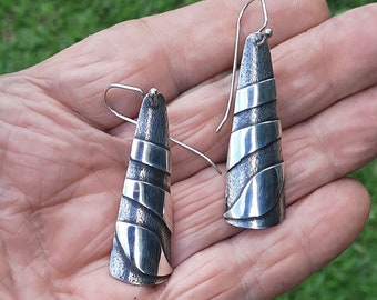 Unique drop earrings. Inspired by the rivers of Borneo. Lightweight statement earrings. Artisan made from up-cycled silver.