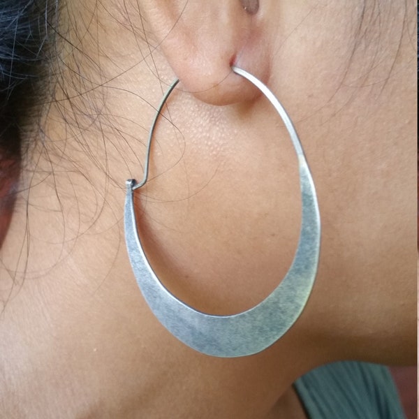 Earthy textured hoop earrings. Sterling silver, (NOT SHINY) jewelry.. 2 1/8" diameter. Also 1 3/4"