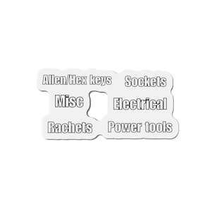 May include: A white sticker with black text labels for tools. The labels include "Allen/Hex keys", "Sockets", "Misc", "Electrical", "Ratchets", and "Power tools". The sticker has a unique shape with cutouts.