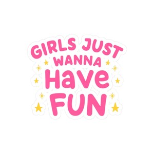 May include: A sticker featuring the text "GIRLS JUST WANNA HAVE FUN" in vibrant pink, with a white outline. The design includes small yellow stars and starbursts, giving it a fun and lively appearance.