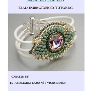 May include: A white leather bracelet with a beaded design featuring turquoise and silver beads, a large purple crystal, and a silver clasp. The bracelet is titled "Maracesh Bracelet Bead Embroidered Tutorial" and is created by "Évi Csizmadia Lajosné / Vicus Design".