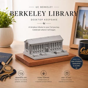 May include: A gray architectural model of the UC Berkeley Library mounted on a rectangular wooden base. The model features detailed columns and a roof structure. Text on the image includes UC BERKELEY BERKELEY LIBRARY DESKTOP KEEPSAKE.