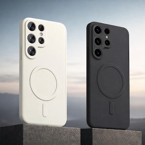 May include: Two phone cases, one cream and one black, are displayed side-by-side. Each case has a circular design and a rectangular cutout. The cases are designed to fit a phone with multiple camera lenses.