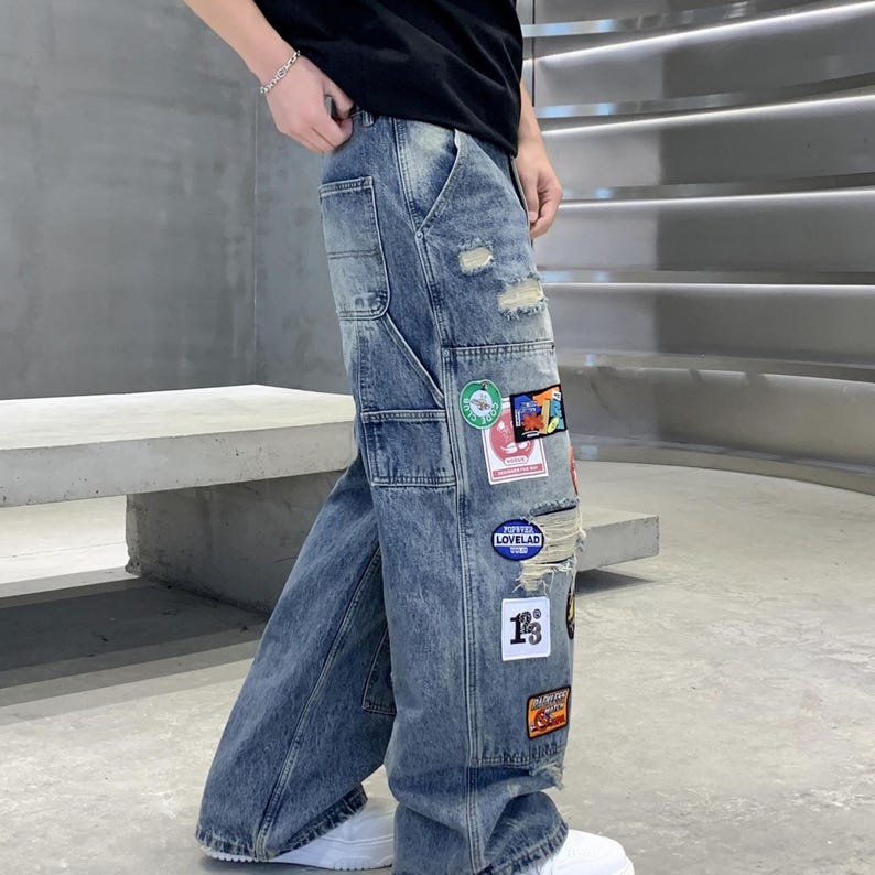Embroidered Ripped Jeans | Denim Wide Leg Pants | Daily Wear | Retro Casual Streetwear

Distressed wide leg denim pants with embroidered patches, ripped details, and retro streetwear style.