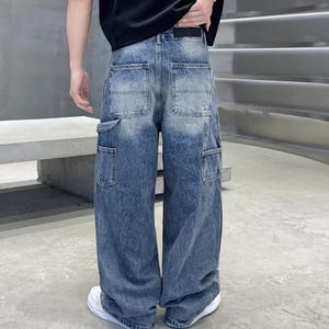 Embroidered Ripped Jeans | Denim Wide Leg Pants | Daily Wear | Retro Casual Streetwear

Distressed wide leg denim pants with embroidered patches, ripped details, and retro streetwear style.