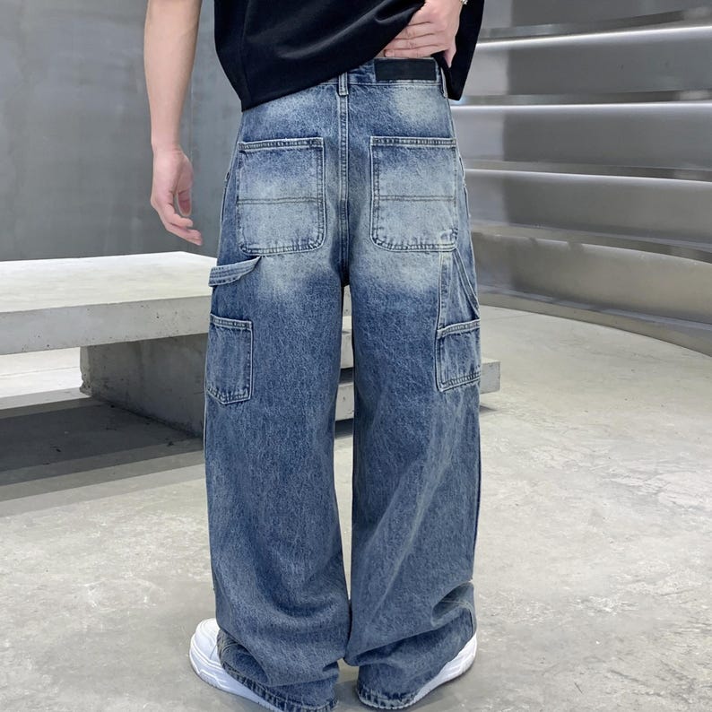Embroidered Ripped Jeans | Denim Wide Leg Pants | Daily Wear | Retro Casual Streetwear

Distressed wide leg denim pants with embroidered patches, ripped details, and retro streetwear style.