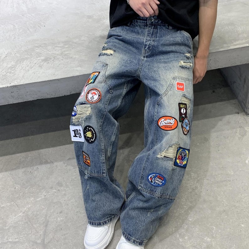 Embroidered Ripped Jeans | Denim Wide Leg Pants | Daily Wear | Retro Casual Streetwear

Distressed wide leg denim pants with embroidered patches, ripped details, and retro streetwear style.