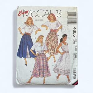 May include: Vintage Easy McCall's sewing pattern envelope. The envelope features illustrations of women's tops and skirts. The pattern number is 4655, size large (18-20). The envelope is white with red and black text.
