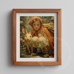 May include: A framed print featuring a young person in a red hooded cloak, squatting beside a white rabbit. The artwork has a fairytale theme, with mushrooms and foliage in the background. The print is in a wooden frame.