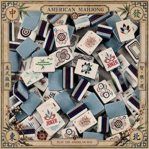 May include: A collection of American Mahjong tiles, featuring a mix of blue, white, and red accents. The tiles display various symbols, numbers, and the word "JOKER". The phrase "PLAY THE AMERICAN WAY" is also visible.