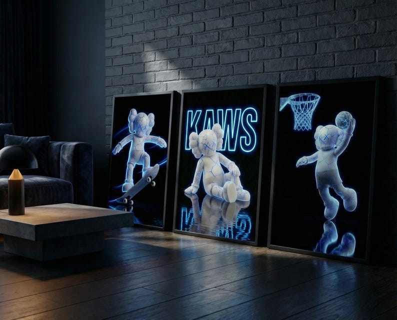 May include: Three framed art prints featuring KAWS characters in a dark room. One print shows a character on a skateboard, another shows the KAWS logo, and the third shows a character playing basketball. The prints have a neon blue glow.